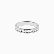 The 14K White Gold 10-Stone Channel Set Diamond Band, 0.50 TCW features a row of sparkling round diamonds set in white gold, shown against a plain white background.