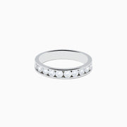 The 14K White Gold 10-Stone Channel Set Diamond Band, 0.75 TCW, features a row of round diamonds in a classic channel setting and is displayed on a plain white background.