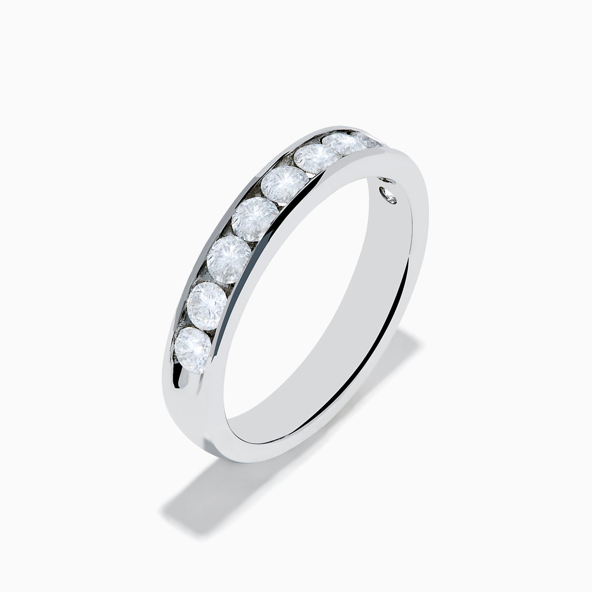 The 14K White Gold 10-Stone Channel Set Diamond Band, 0.75 TCW, features a row of round diamonds in a classic channel setting and is displayed on a plain white background.