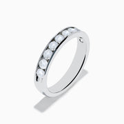 The 14K White Gold 10-Stone Channel Set Diamond Band, 0.75 TCW, features a row of round diamonds in a classic channel setting and is displayed on a plain white background.