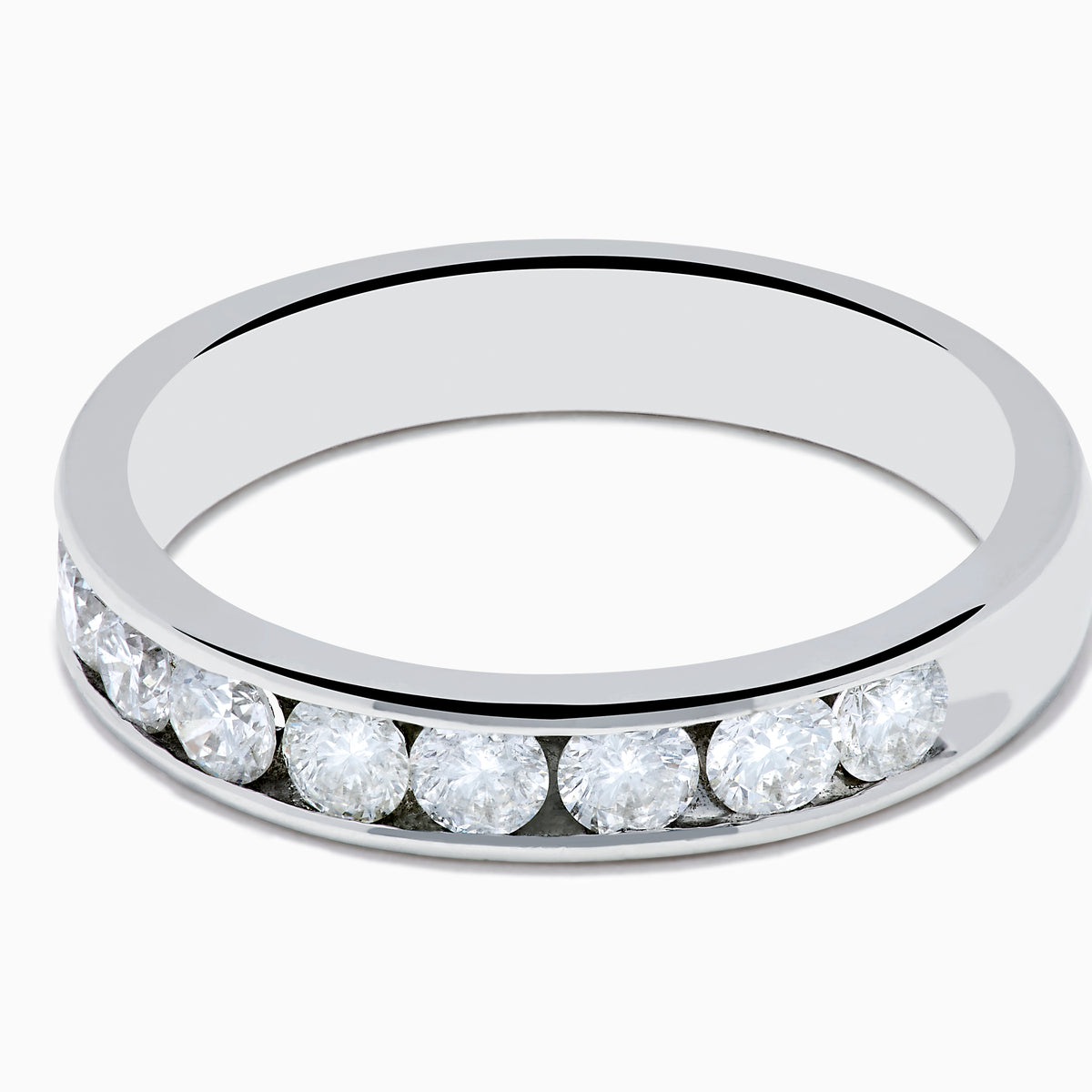 The 14K White Gold 10-Stone Channel Set Diamond Band, 0.75 TCW, features a row of round diamonds in a classic channel setting and is displayed on a plain white background.