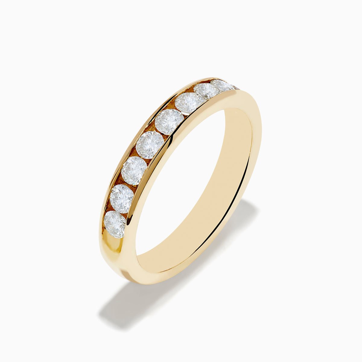 The 14K Yellow Gold 10-Stone Channel Set Diamond Band (0.75 TCW) features a row of round white diamonds in a channel setting, showcased against a plain white background.