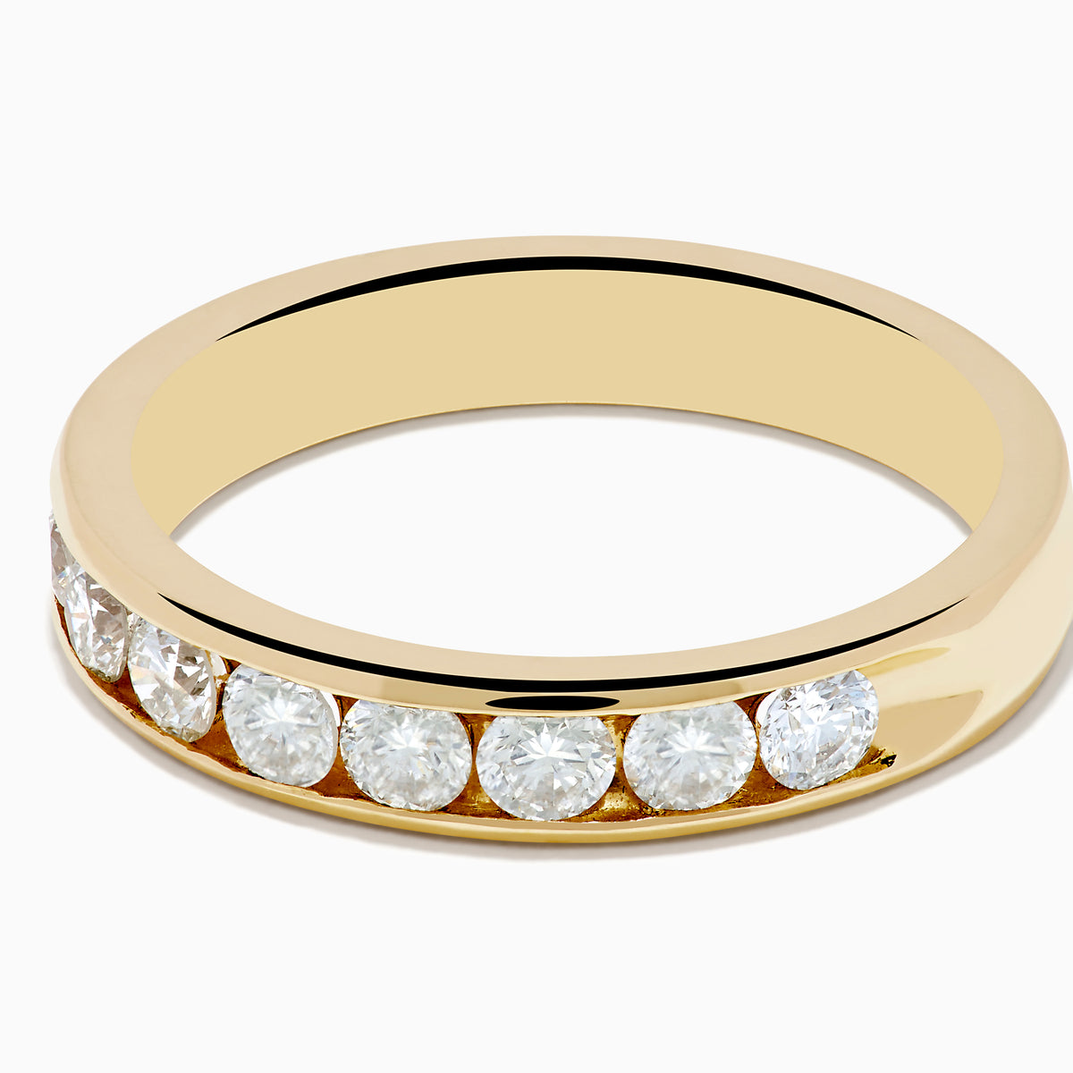 The 14K Yellow Gold 10-Stone Channel Set Diamond Band (0.75 TCW) features a row of round white diamonds in a channel setting, showcased against a plain white background.