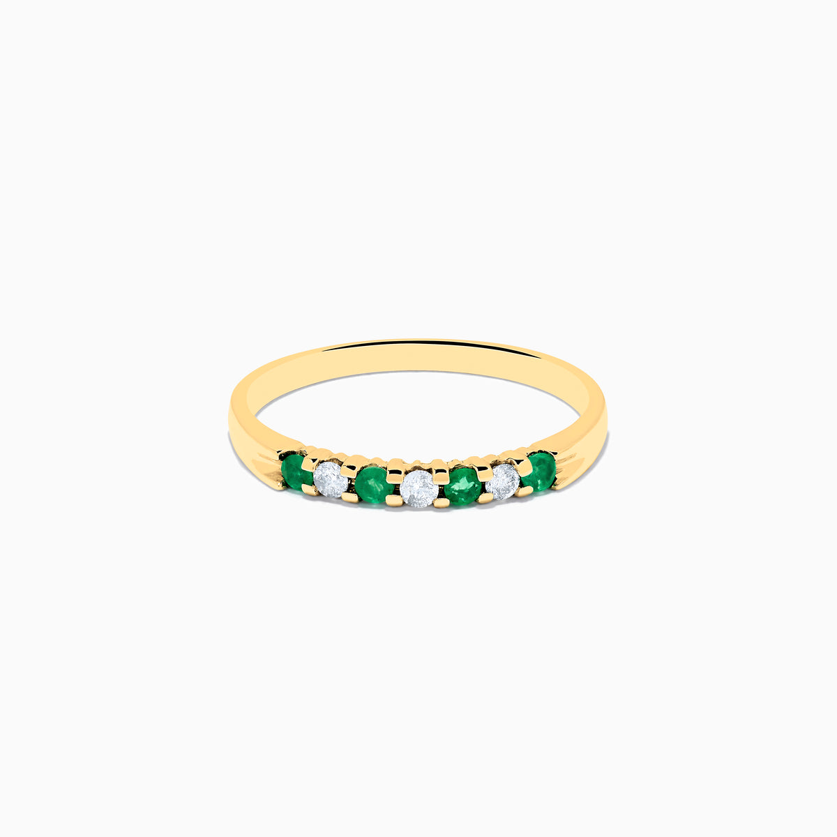 The 14K Yellow Gold 7-Stone Emerald & Diamond Band, 0.25 TCW, features alternating round white diamonds and emeralds set in a row on the band, shown against a white background.
