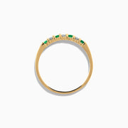 The 14K Yellow Gold 7-Stone Emerald & Diamond Band, 0.25 TCW, features alternating round white diamonds and emeralds set in a row on the band, shown against a white background.