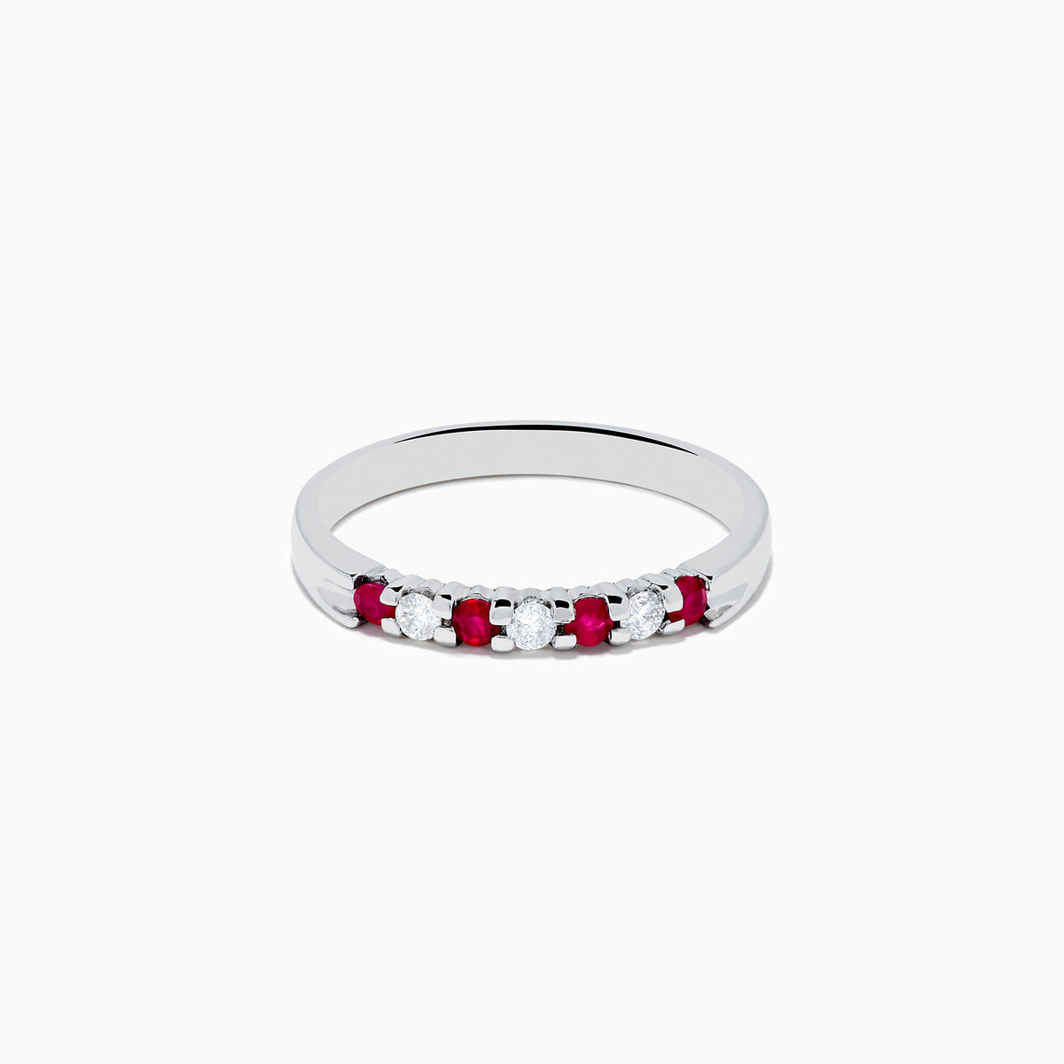 The 14K White Gold 7-Stone Ruby & Diamond Band, 0.25 TCW, showcases alternating vivid red rubies and sparkling round white diamonds set in a row along the band, shown on a white background.