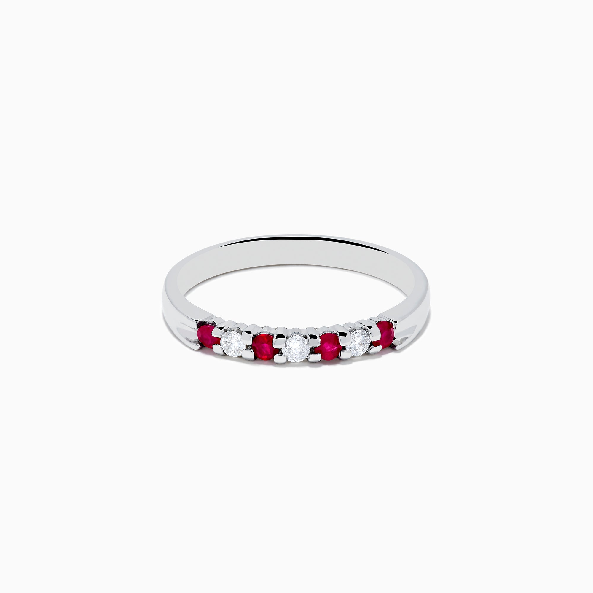 The 14K White Gold 7-Stone Ruby & Diamond Band, 0.25 TCW, showcases alternating vivid red rubies and sparkling round white diamonds set in a row along the band, shown on a white background.