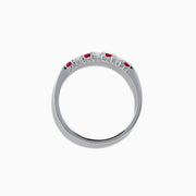 The 14K White Gold 7-Stone Ruby & Diamond Band, 0.25 TCW, showcases alternating vivid red rubies and sparkling round white diamonds set in a row along the band, shown on a white background.