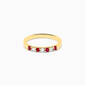 The 14K Yellow Gold 7-Stone Ruby & Diamond Band, 0.25 TCW, features an alternating row of round white diamonds and vibrant rubies set across the band.