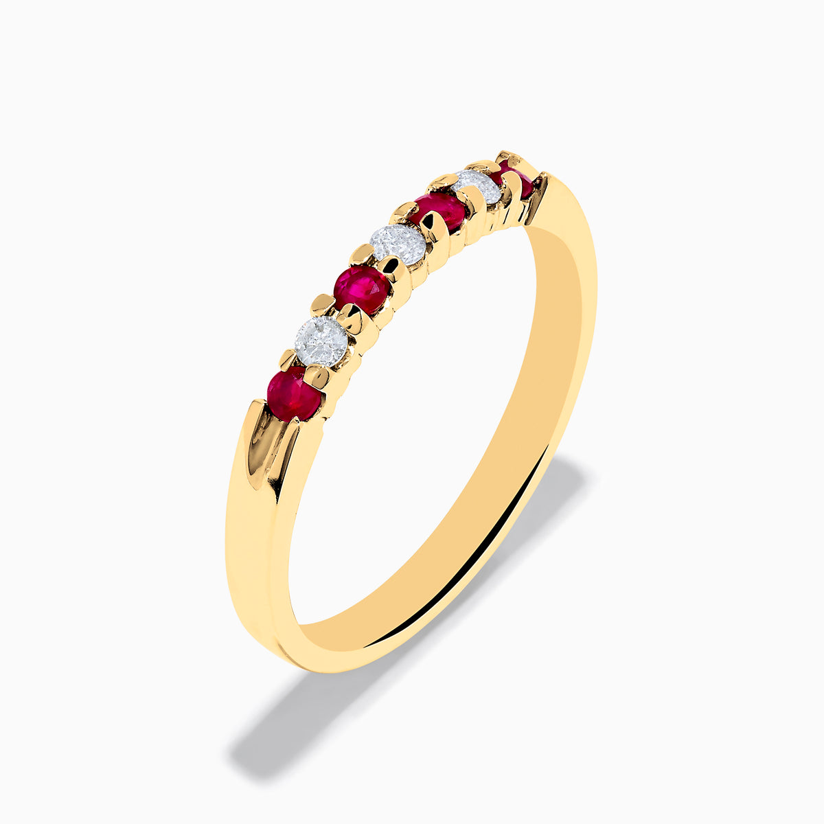The 14K Yellow Gold 7-Stone Ruby & Diamond Band, 0.25 TCW, features an alternating row of round white diamonds and vibrant rubies set across the band.