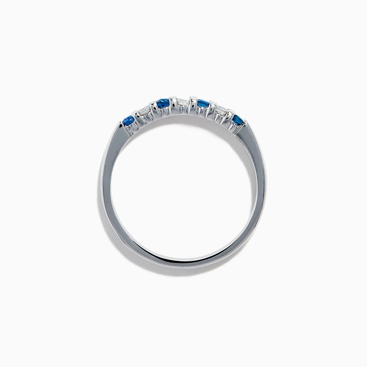 A 14K white gold band featuring alternating blue sapphires and diamonds (0.25 TCW), displayed against a white background.