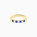 The 14K Yellow Gold 7-Stone Blue Sapphire & Diamond Band (0.25 TCW) features alternating blue sapphires and diamonds set in a row on the band, shown against a plain white background.