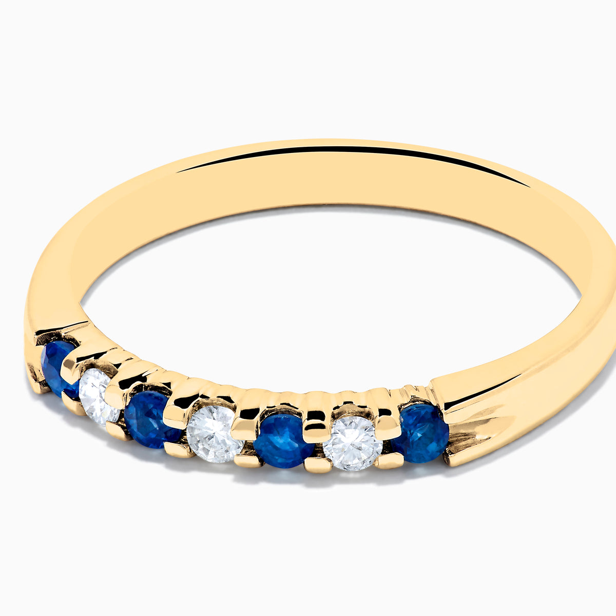 The 14K Yellow Gold 7-Stone Blue Sapphire & Diamond Band (0.25 TCW) features alternating blue sapphires and diamonds set in a row on the band, shown against a plain white background.