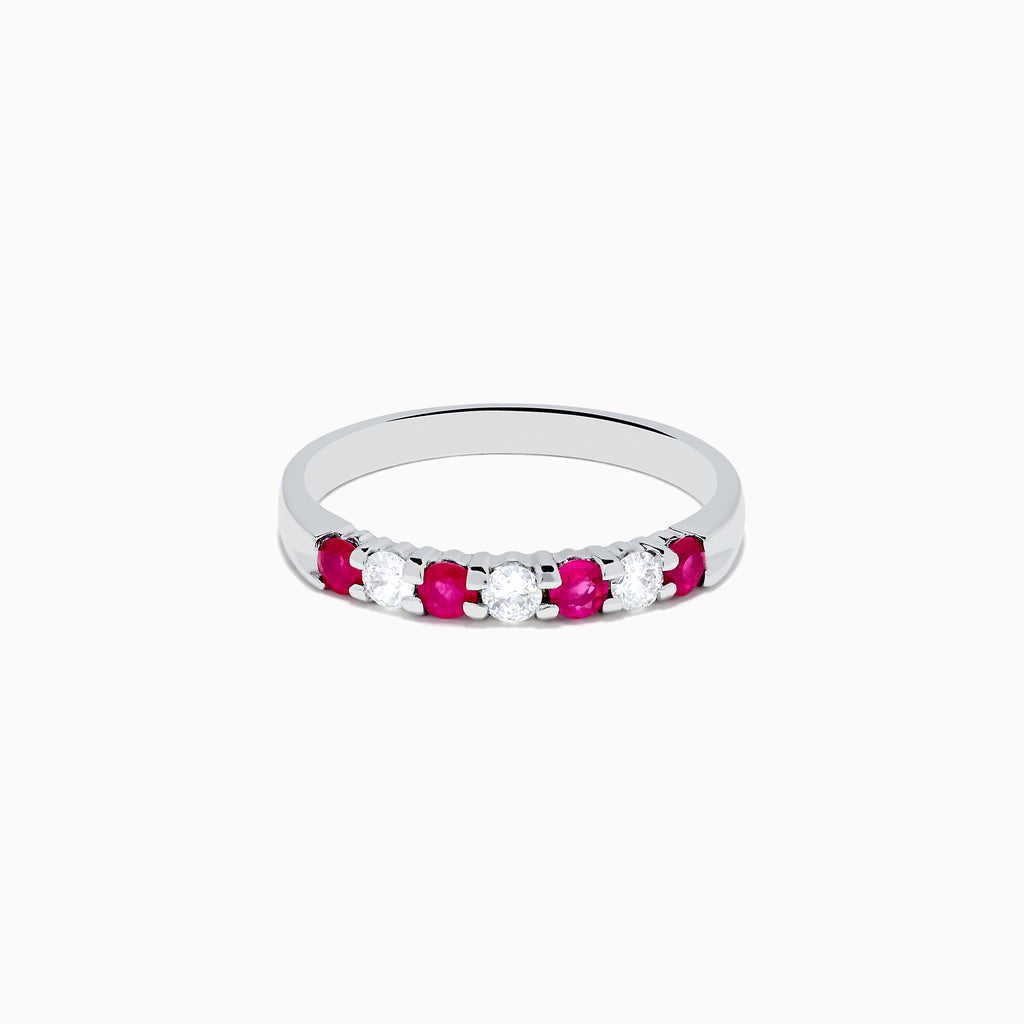 The 14K White Gold 7-Stone Ruby & Diamond Band, 0.50 TCW, showcases alternating round white diamonds and vibrant rubies on the front half of the band, set against a plain white background.