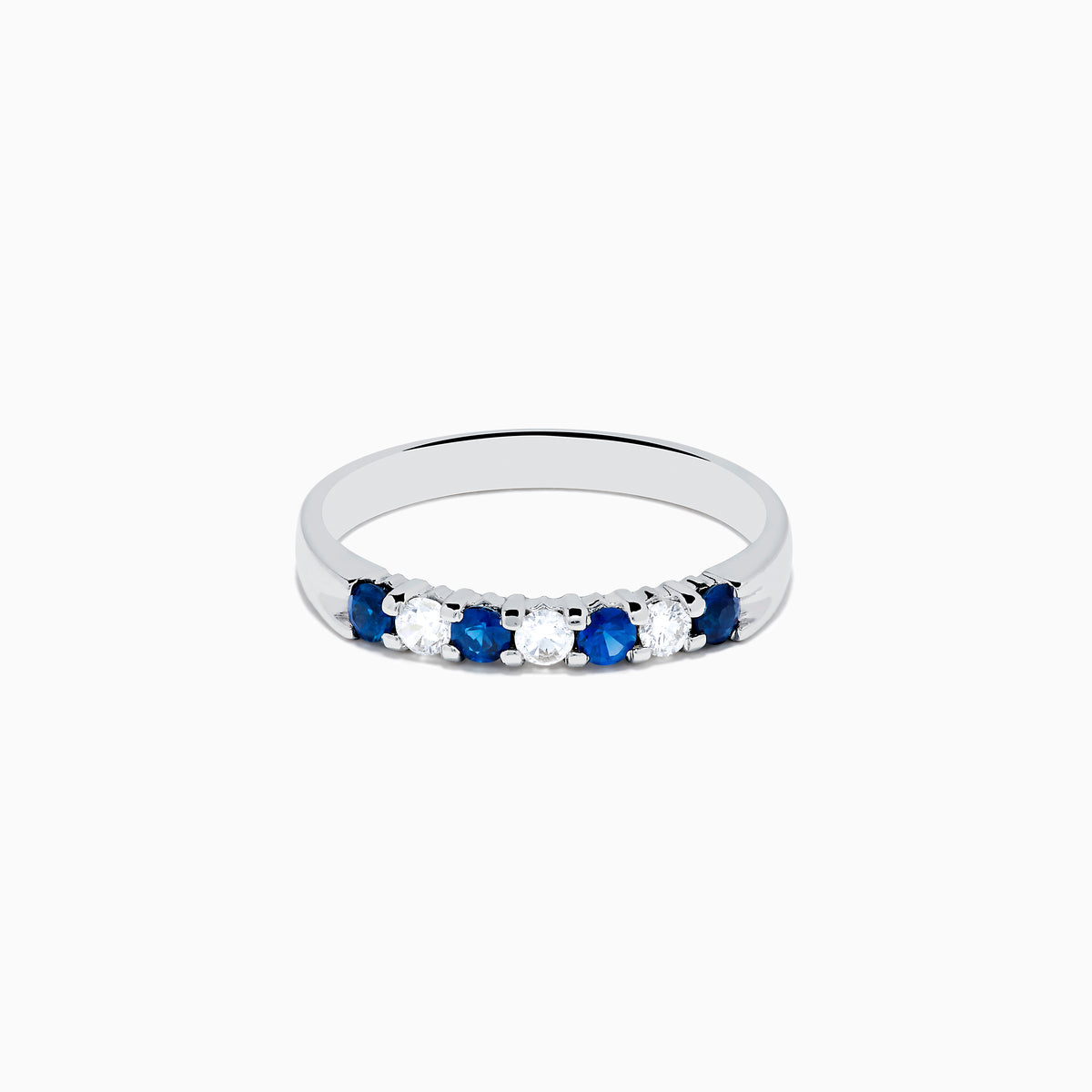 The 14K White Gold 7-Stone Blue Sapphire & Diamond Band (0.50 TCW) features alternating blue sapphires and diamonds set in a row, shown on a white background.