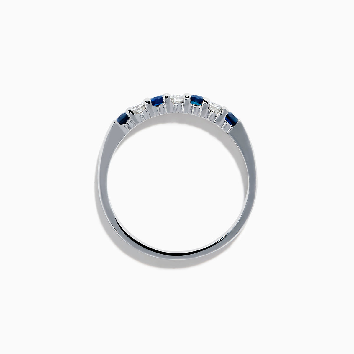 The 14K White Gold 7-Stone Blue Sapphire & Diamond Band (0.50 TCW) features alternating blue sapphires and diamonds set in a row, shown on a white background.