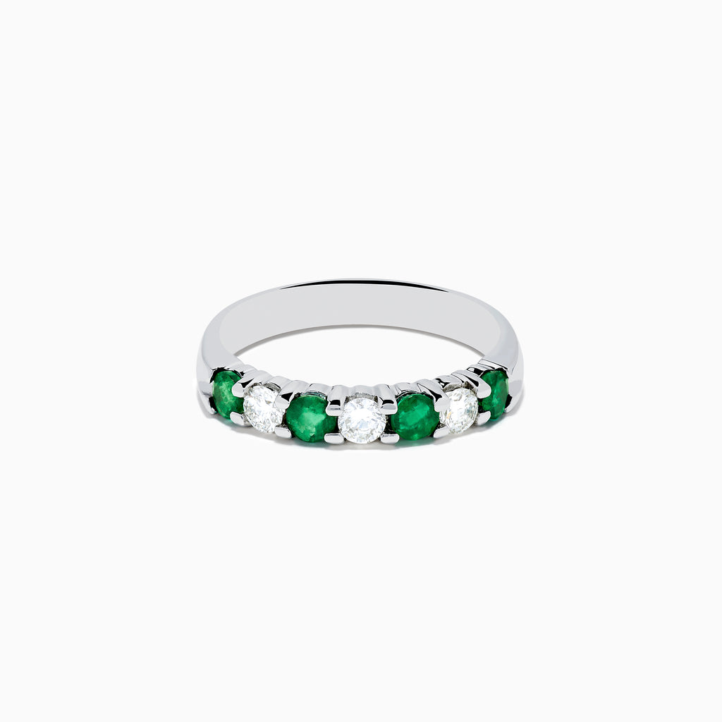 The 14K White Gold 7-Stone Emerald & Diamond Band (0.65 TCW) features alternating round emerald and diamond gemstones set in a row, displayed against a white background.