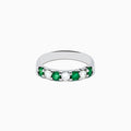 The 14K White Gold 7-Stone Emerald & Diamond Band (0.65 TCW) features alternating round emerald and diamond gemstones set in a row, displayed against a white background.