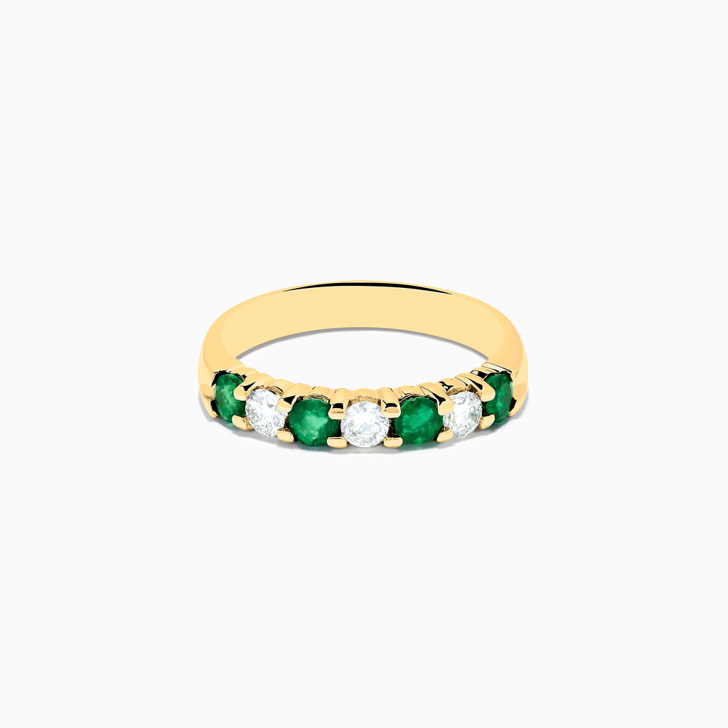 The 14K Yellow Gold 7-Stone Emerald & Diamond Band, 0.65 TCW, features alternating round green emeralds and white diamonds set in a row along the band, shown against a plain white background.