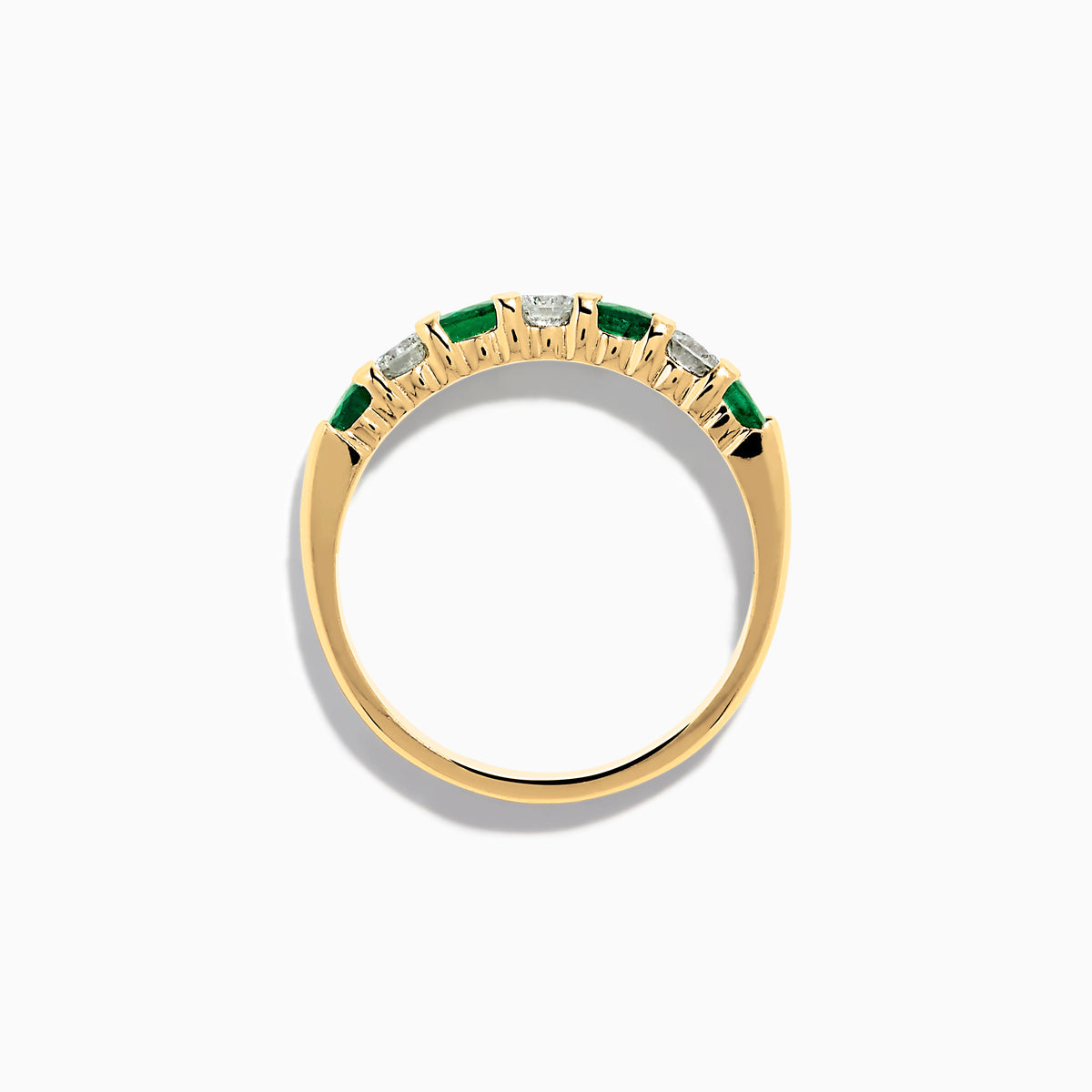 The 14K Yellow Gold 7-Stone Emerald & Diamond Band, 0.65 TCW, features alternating round green emeralds and white diamonds set in a row along the band, shown against a plain white background.