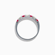 The 14K White Gold 7-Stone Ruby & Diamond Band, 0.65 TCW, features alternating round rubies and sparkling diamonds, showcased on a white background.