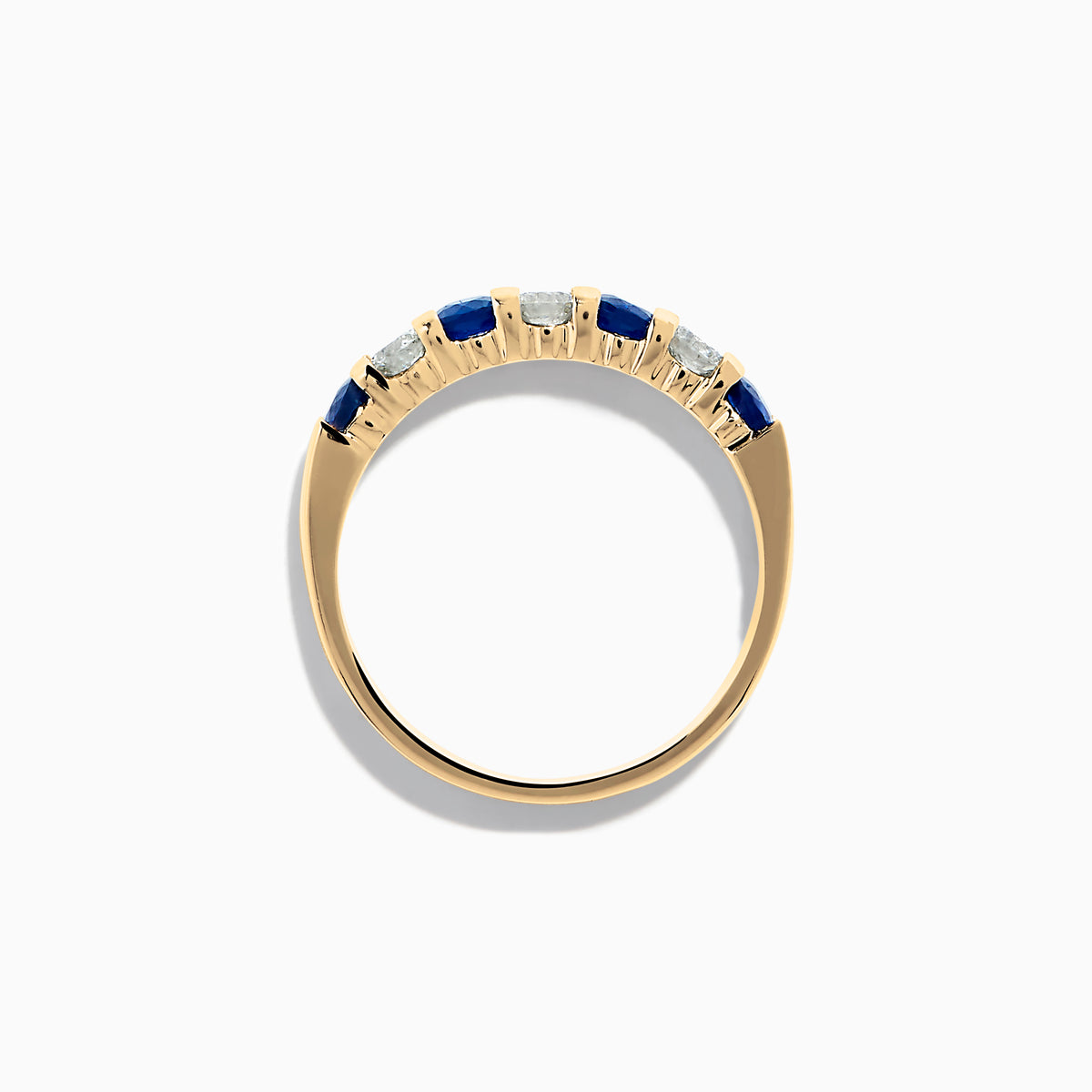 The 14K Yellow Gold 7-Stone Blue Sapphire & Diamond Band, 0.65 TCW, features alternating round blue sapphires and white diamonds set in a row along the band.