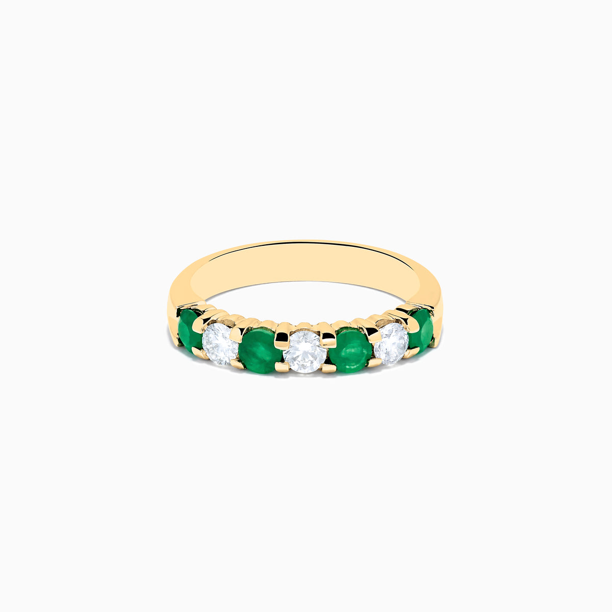 The 14K Yellow Gold 7-Stone Emerald & Diamond Band, 1.00 TCW, features alternating round white diamonds and vibrant emeralds set in a row, shown against a plain white background.