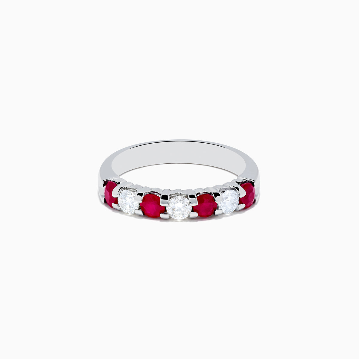 The 14K White Gold 7-Stone Ruby & Diamond Band, 1.00 TCW, showcases alternating round rubies and clear diamonds in a single row along the band, displayed on a white background.