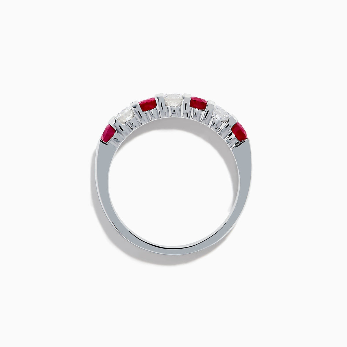 The 14K White Gold 7-Stone Ruby & Diamond Band, 1.00 TCW, showcases alternating round rubies and clear diamonds in a single row along the band, displayed on a white background.