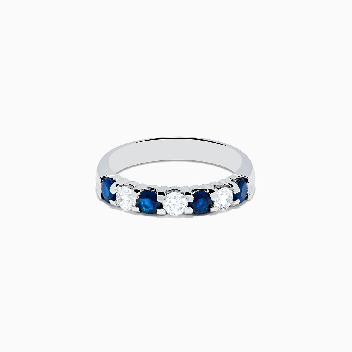 The 14K White Gold 7-Stone Blue Sapphire & Diamond Band, 1.00 TCW, features alternating round blue sapphires and white diamonds, displayed on a plain white background.