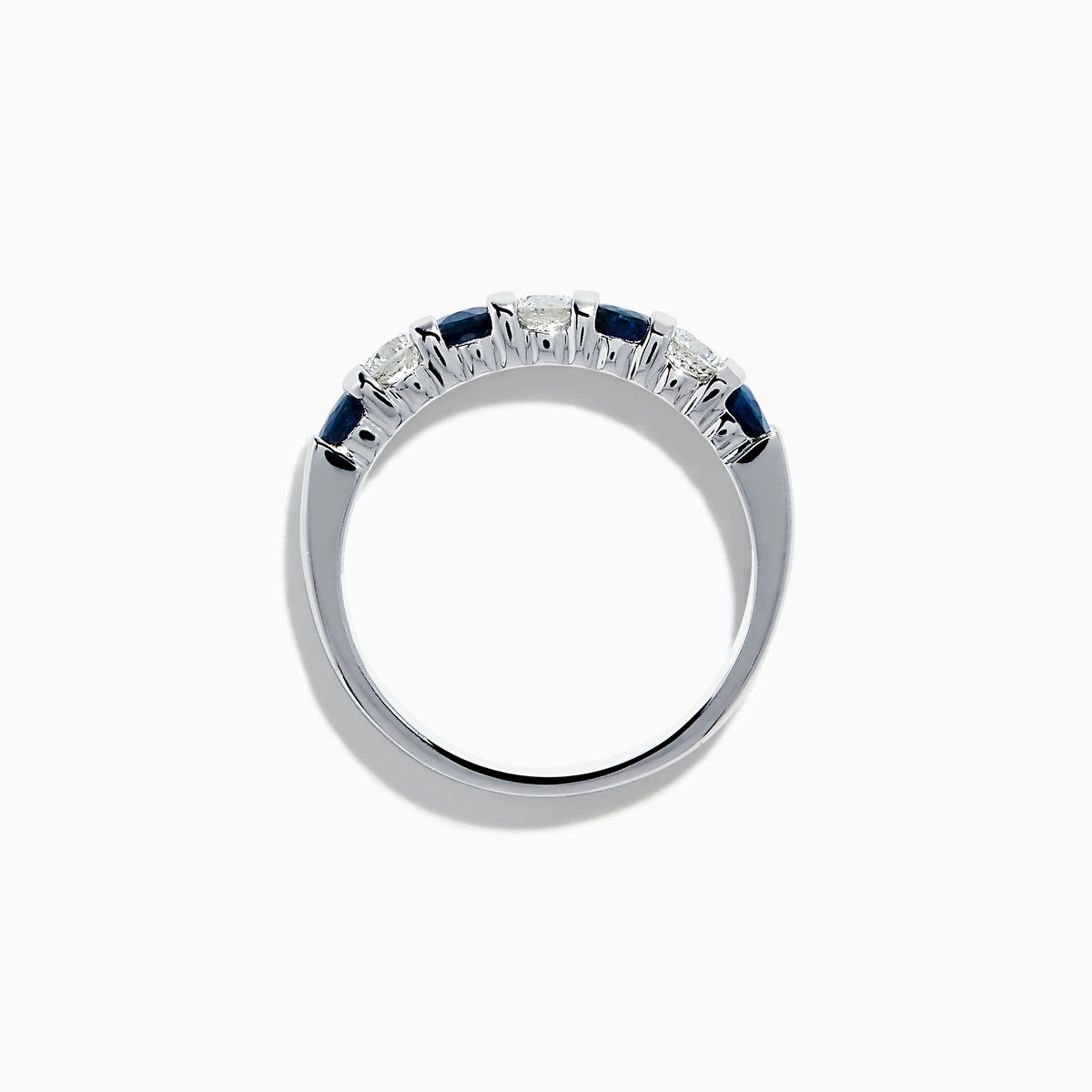 The 14K White Gold 7-Stone Blue Sapphire & Diamond Band, 1.00 TCW, features alternating round blue sapphires and white diamonds, displayed on a plain white background.