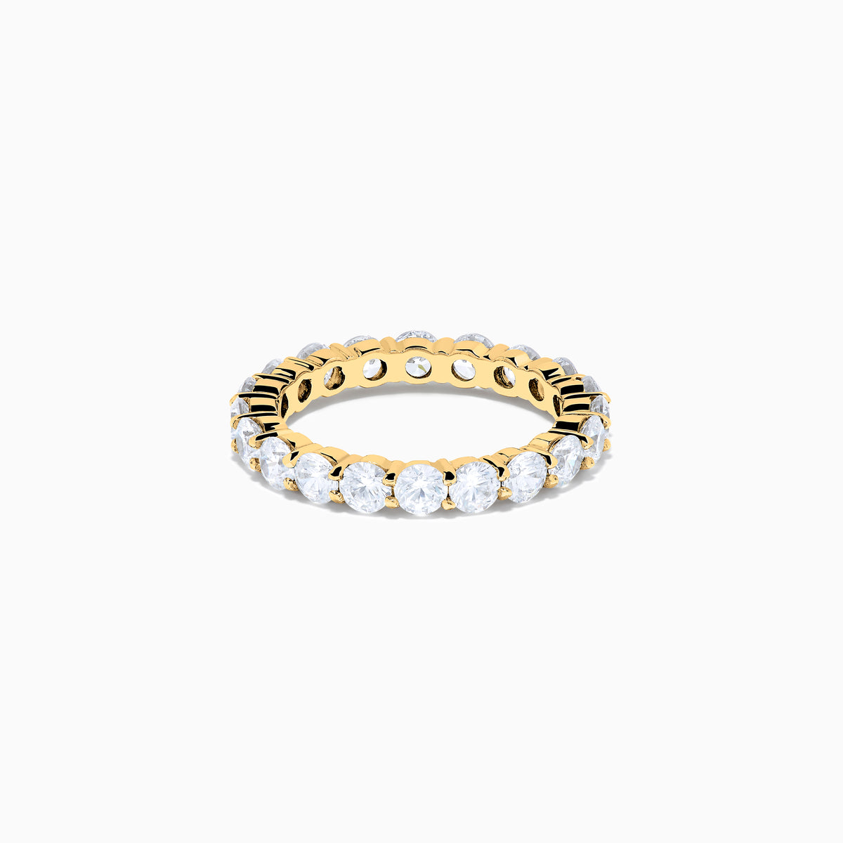 The 14K Yellow Gold Prong Set Diamond Eternity Band, 3.00 TCW, features round white diamonds encircling the entire ring and is shown against a plain white background.