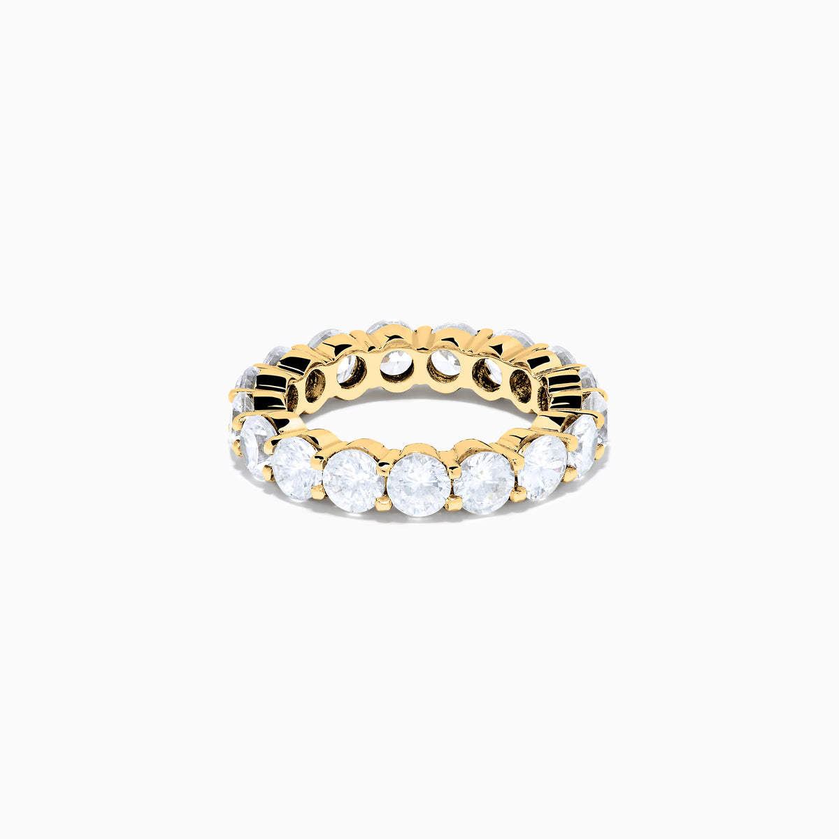 The 14K Yellow Gold Prong Set Diamond Eternity Band, 4.00 TCW, features round diamonds set all around and is shown against a plain white background.