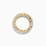 The 14K Yellow Gold Prong Set Diamond Eternity Band, 4.00 TCW, features round diamonds set all around and is shown against a plain white background.
