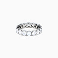The 14K White Gold Prong Set Diamond Eternity Band, 5.00 TCW, features round diamonds encircling the band and is shown against a plain white background.