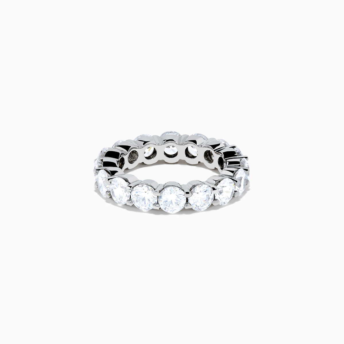 The 14K White Gold Prong Set Diamond Eternity Band, 5.00 TCW, features round diamonds encircling the band and is shown against a plain white background.