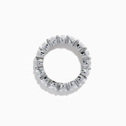 The 14K White Gold Prong Set Diamond Eternity Band, 5.00 TCW, features round diamonds encircling the band and is shown against a plain white background.