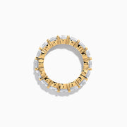 The 14K Yellow Gold Prong Set Diamond Eternity Band, 5.00 TCW, features a continuous row of round prong-set diamonds encircling the band, shown against a white background.
