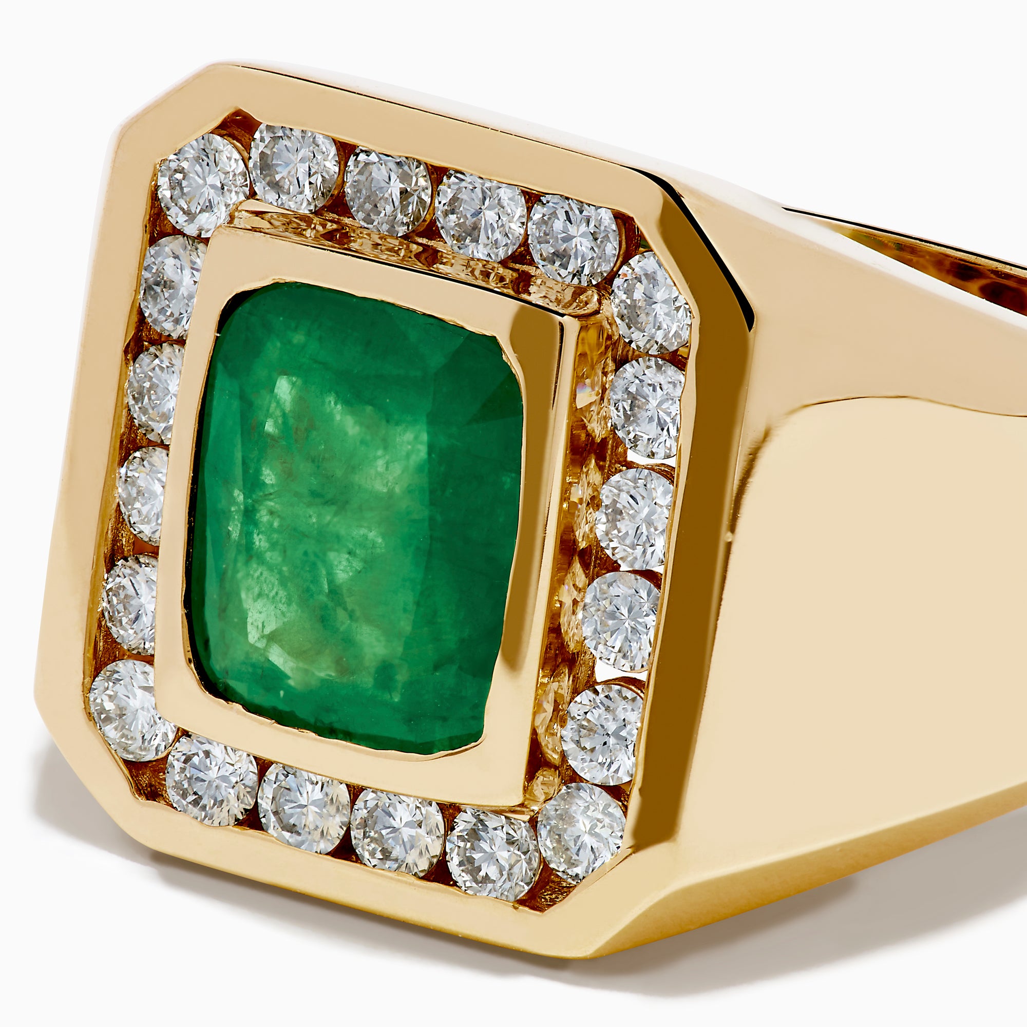 The Men's 14K Yellow Gold Emerald and Diamond Statement Ring showcases a square green emerald center, bordered by small round white diamonds, displayed on a plain white background.