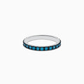 The Bella Bleu 14K White Gold Blue Diamond Ring showcases a band of small, round blue diamonds set all around and is beautifully displayed on a white background.