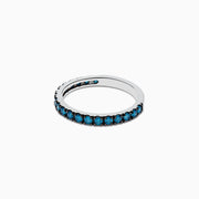 The Bella Bleu 14K White Gold Blue Diamond Ring showcases a band of small, round blue diamonds set all around and is beautifully displayed on a white background.