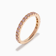 The 18K Rose Gold Pink Diamond Pavé Band Ring showcases a row of sparkling pink diamonds set along the band, photographed on a plain white background.