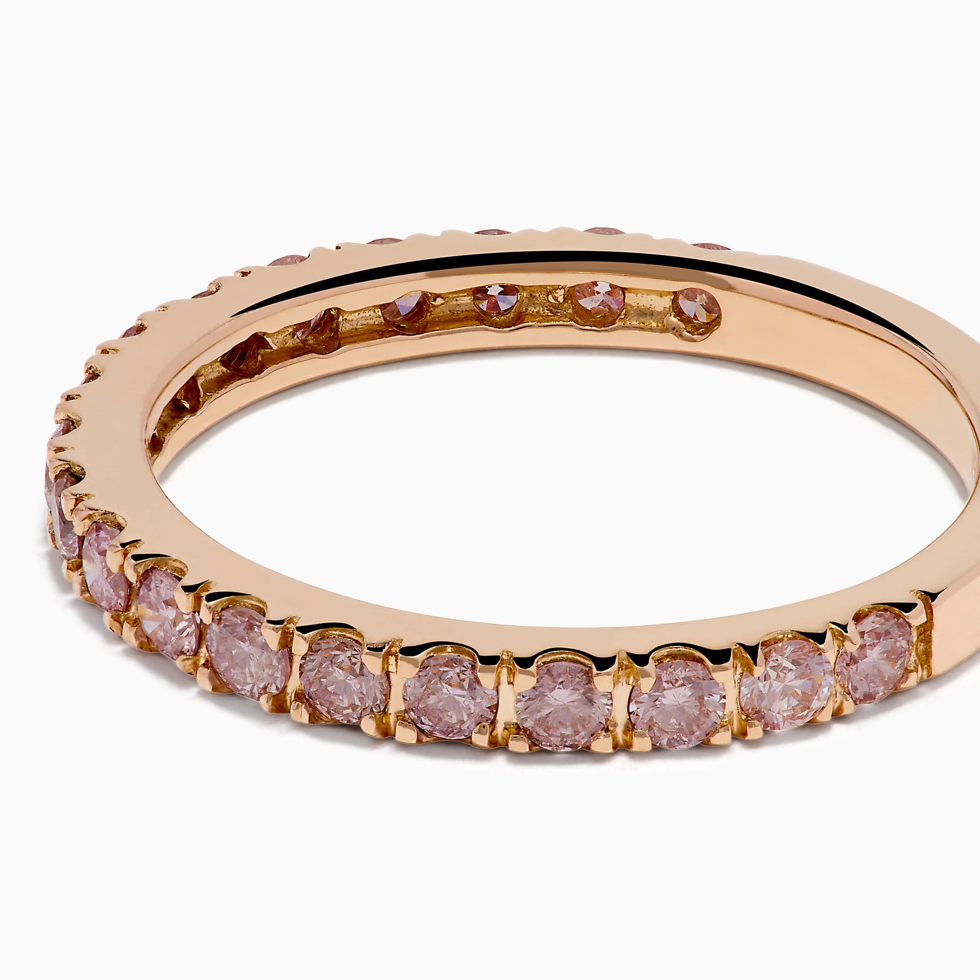The 18K Rose Gold Pink Diamond Pavé Band Ring showcases a row of sparkling pink diamonds set along the band, photographed on a plain white background.