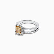 The Canare 14K Two-Tone Gold Yellow Diamond Ring Set features a cushion-cut yellow center stone with a halo of white diamonds and a split shank band adorned with more diamonds, showcasing the signature Effy Canare style.