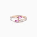 The 14K Rose Gold Pink Sapphire and Diamond Bypass Ring features two pear-shaped pink sapphires at each end and round white diamonds along the band, shown on a white background.