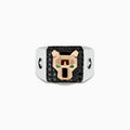 The Mens Signature 14K Two Tone Black Diamond and Emerald Panther Ring showcases a geometric gold panther head with green gemstone eyes set on a black, rectangular background adorned with black diamonds.