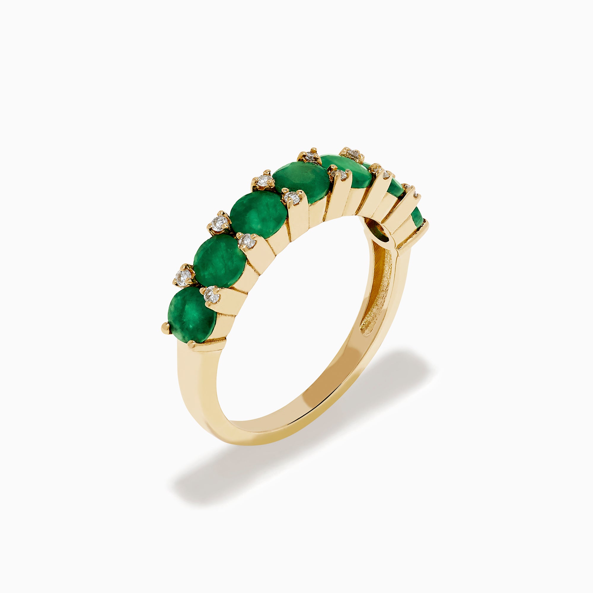 The 14K Yellow Gold Emerald and Diamond Band showcases oval green emeralds accented by small round white diamonds, beautifully displayed on a white background.