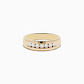 The Mens 14K Yellow Gold Diamond Channel Set Ring features a smooth band with eight round diamonds set in a straight row across the front, displayed against a plain white background.