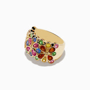 The Watercolors 14K Yellow Gold Multi Sapphire and Tsavorite Ring features a wide gold band with colorful gemstones set in vibrant floral and circular patterns.