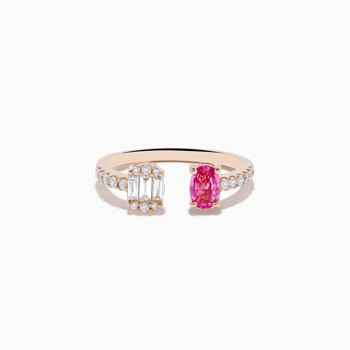 The 14K Rose Gold Pink Sapphire and Diamond Toi Et Moi Ring features a diamond-set band, a rectangular cluster of baguette and round diamonds on one side, and an oval pink sapphire on the other.